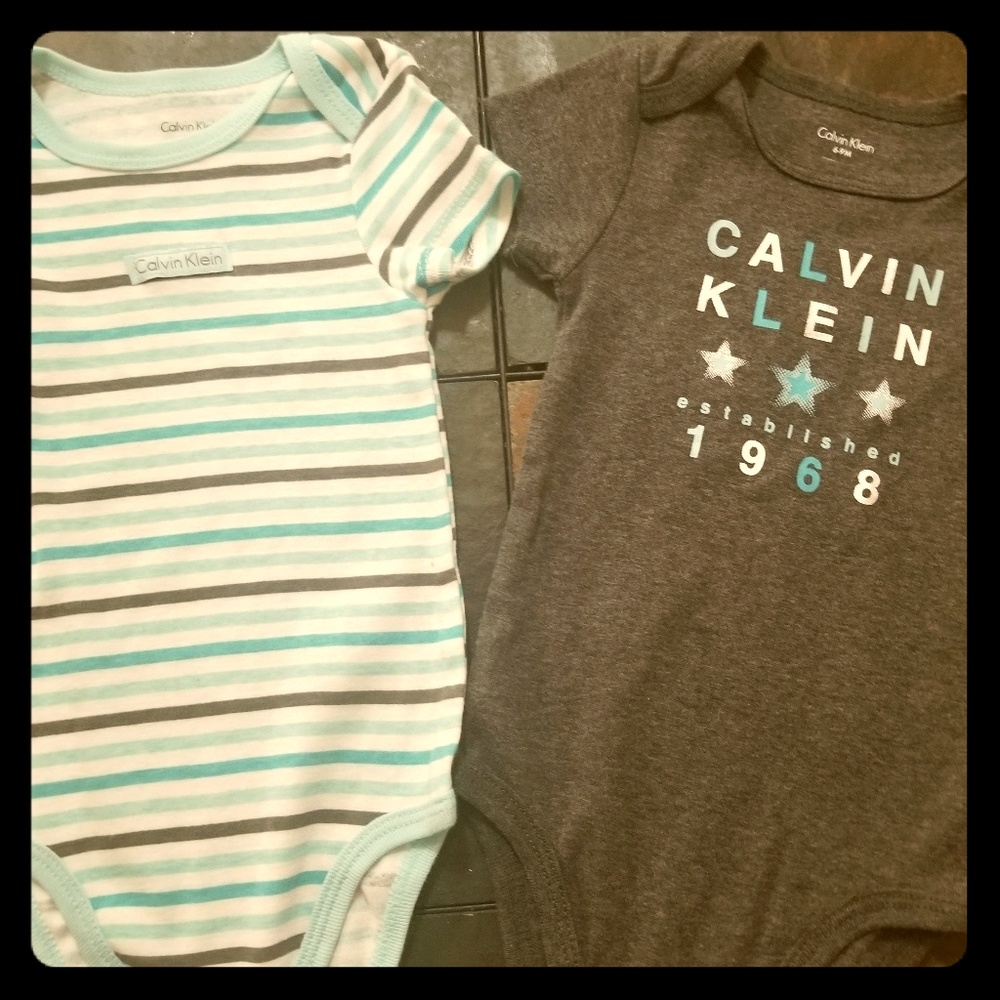 4 Calvin Klein Onesies